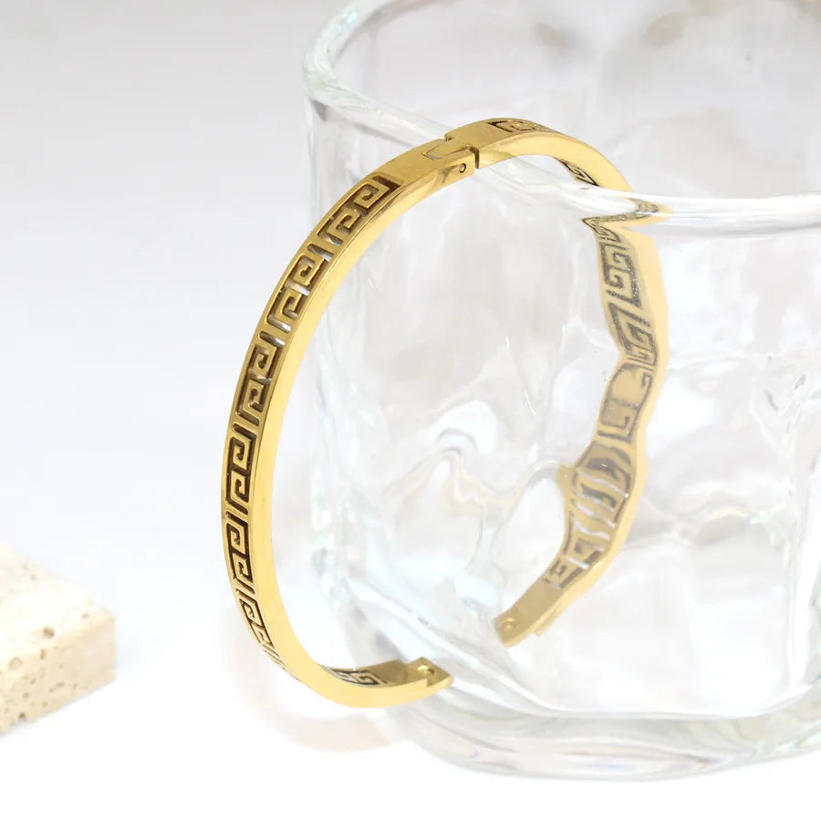Hollow Greek Pattern Bracelet on a clean product background