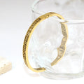 Hollow Greek Pattern Bracelet on a clean product background