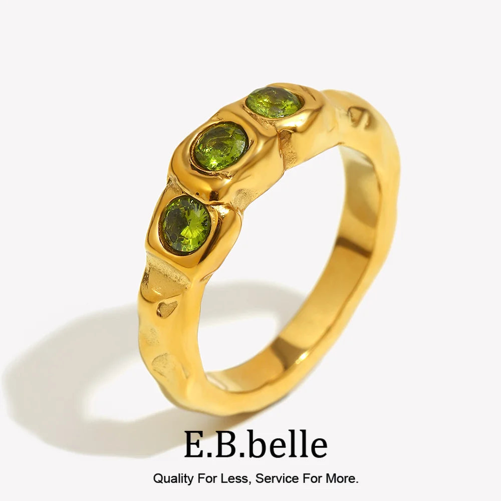 Green Triple Zircon Ring on a clean product background