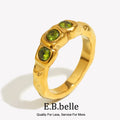 Green Triple Zircon Ring on a clean product background