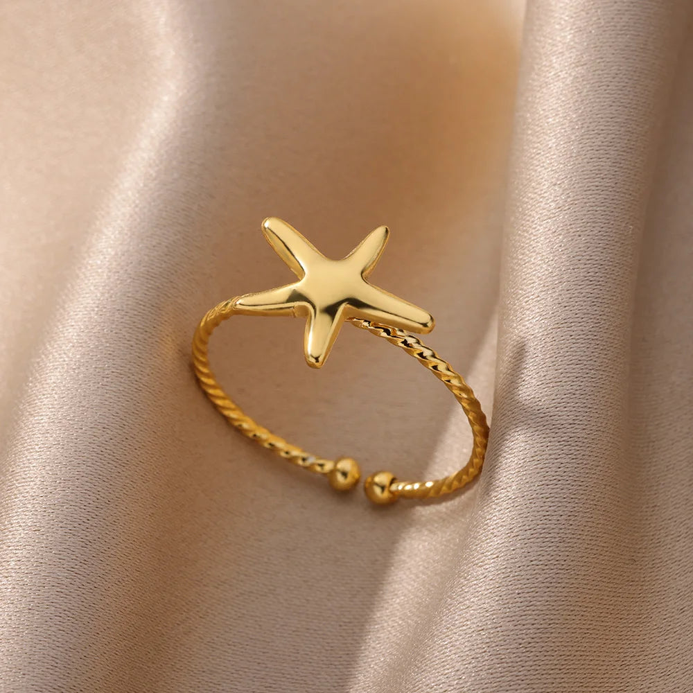 Shell & Star Open Ring on a clean product background