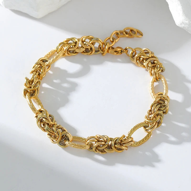 Twisted Gold Stainless Steel Bracelet on a clean product background