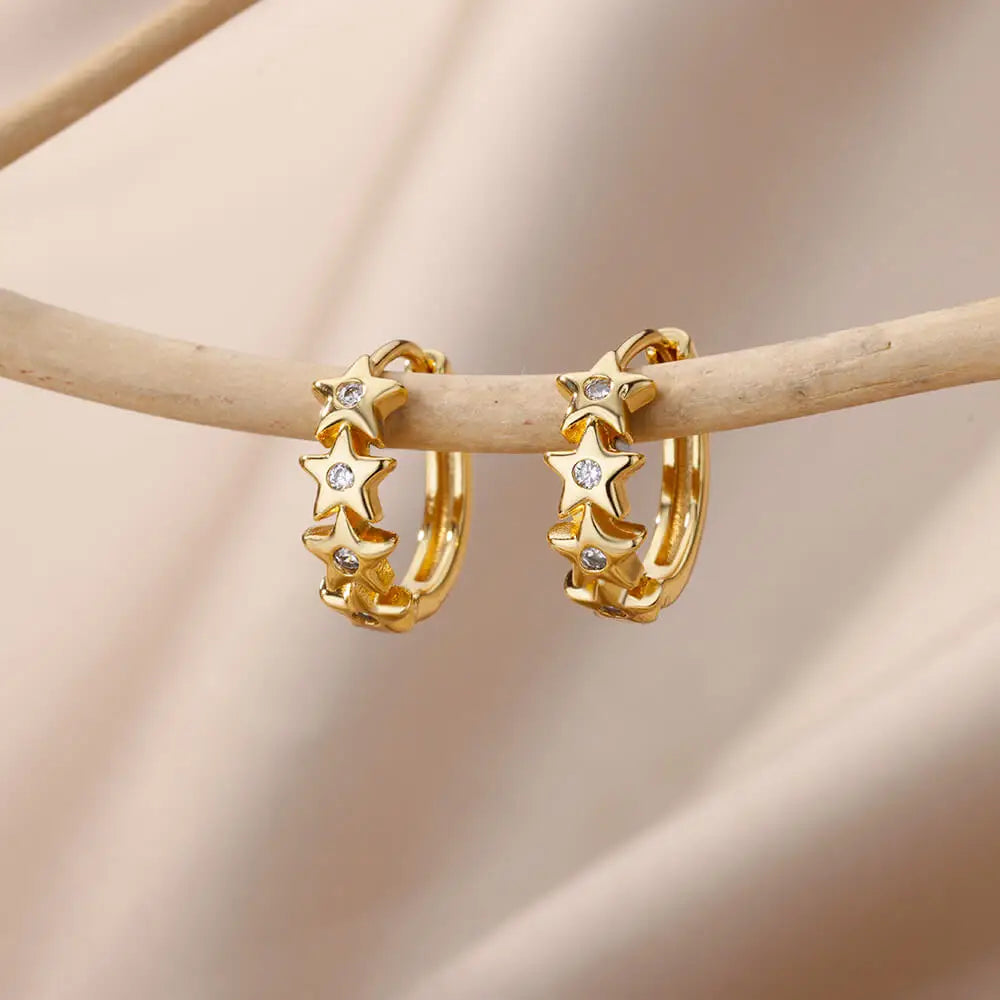 Gold Star Hoop Earrings on a clean product background