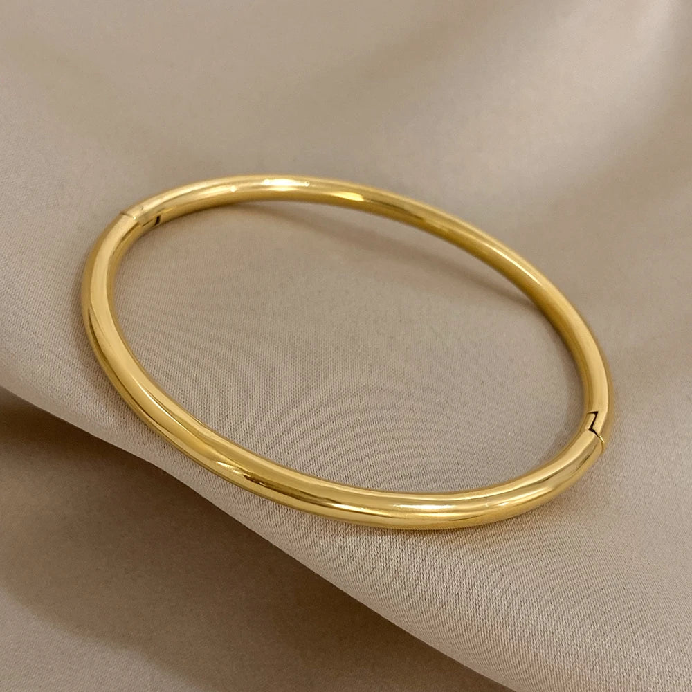 Thin Polished Cuff Bracelet on a clean product background