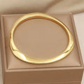 Irregular Metal Bangle Bracelet on a clean product background
