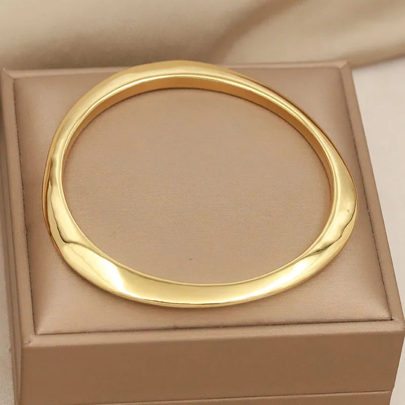 Irregular Metal Bangle Bracelet on a clean product background