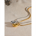Gold Waterdrop Pendant Necklace on a clean product background