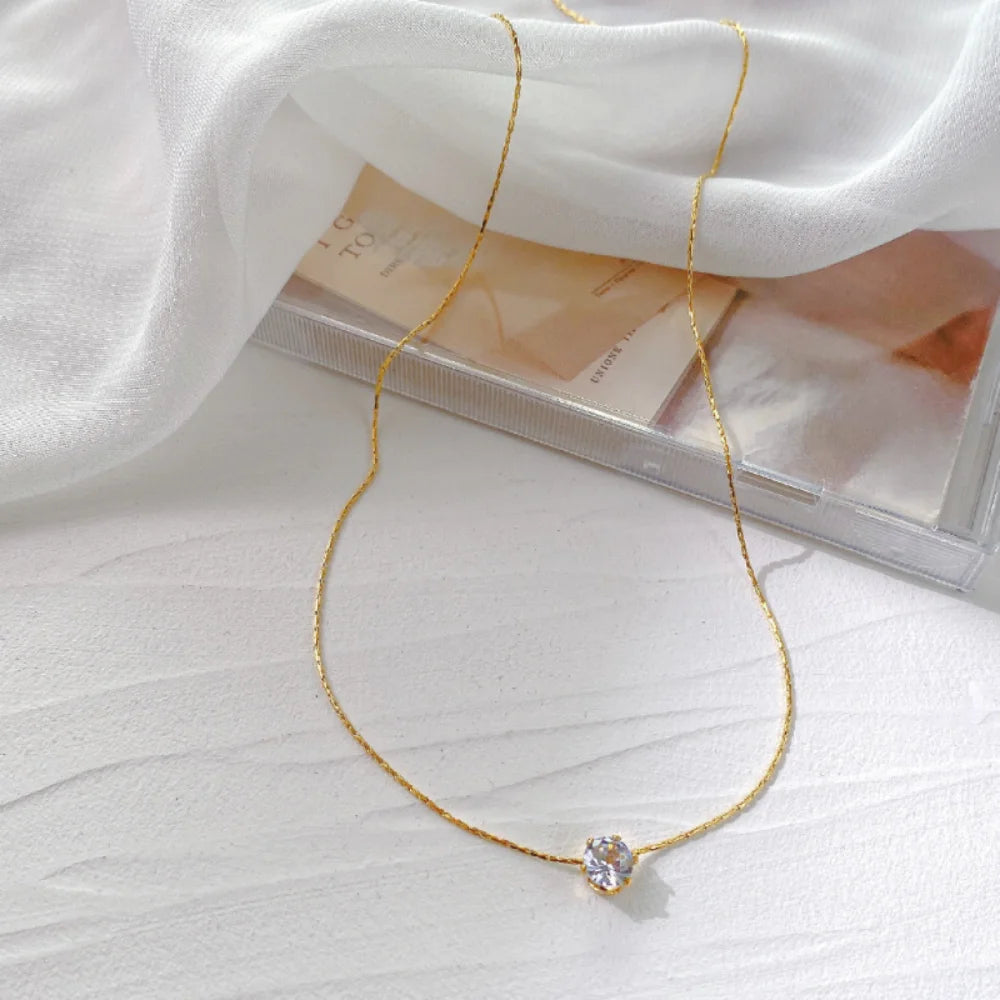 Minimal CZ Round Pendant Necklace on a clean product background