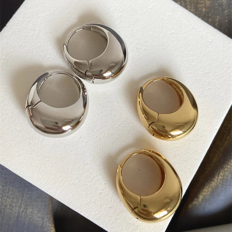 Smooth Chunky Hoop Earrings on a clean product background